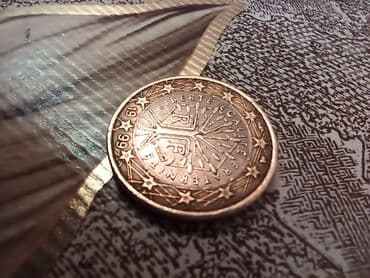 Əntiq vazalar: Məhsul: Fransa 1999 sikkəsi Təsvir: - Ön üzdə “RF” (République — 1