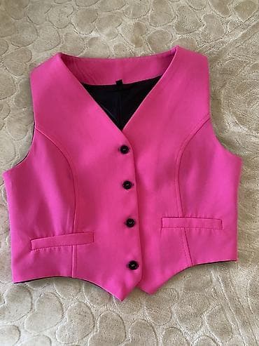 Qadın üçün klassik fason qolsuz jilet.1,2 defe geyinilib yeni qalıb 25