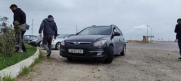 Продажа авто: Hyundai i30 CW, qara rəngli universal kuzov. Xüsusiyyətlər: - Kuzov — 9