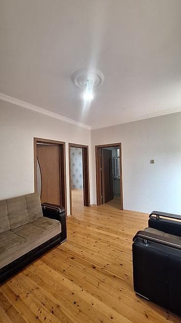 Daşınmaz əmlak: 3 otaqlı mənzil – geniş zal, iki yataq otağı və ayrı mətbəx — 1