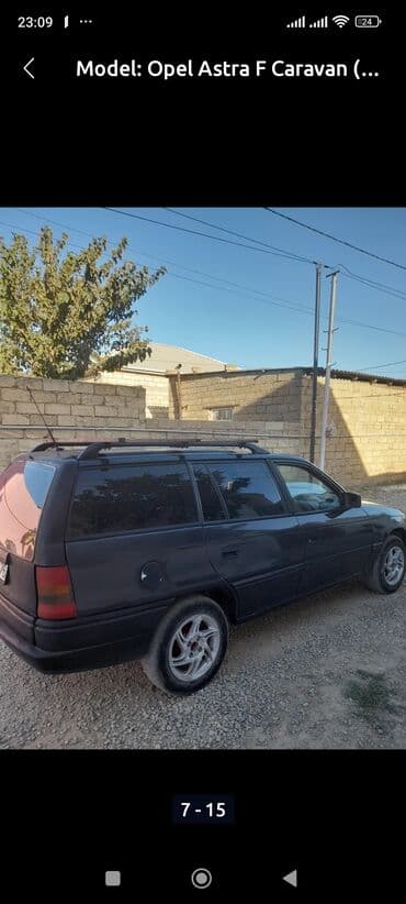 turbo az opel astra 2010: Opel Astra Caravan – universal kuzovlu, qara rəngdə. Əsas — 9