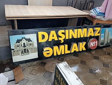 Məhsul: “Daşınmaz Əmlak №1” reklam lövhəsi - Material: parlaq qara