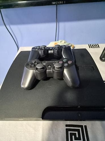 ps oyun diski: Məhsul: Sony PlayStation 3 (Slim) oyun konsolu + 2 ədəd DualShock 3 — 1