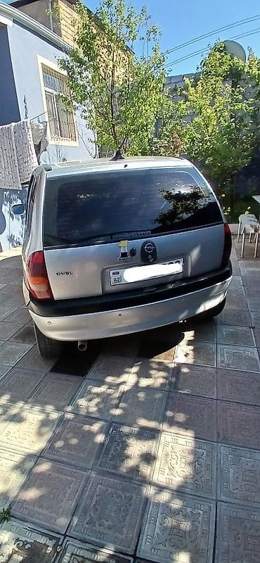 Opel Corsa hatchback - Kuzov: 5 qapılı, gümüşü rəng - Mühərrik