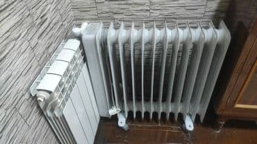 мобильные кондиционеры в баку: Ağ rəngli, təkərli, daşınması asan yağlı radiator. Bu radiator rahat — 1