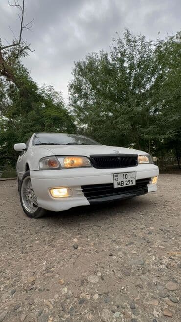 Nissan Sunny: 1.6 л | 2000 г. Седан — 3