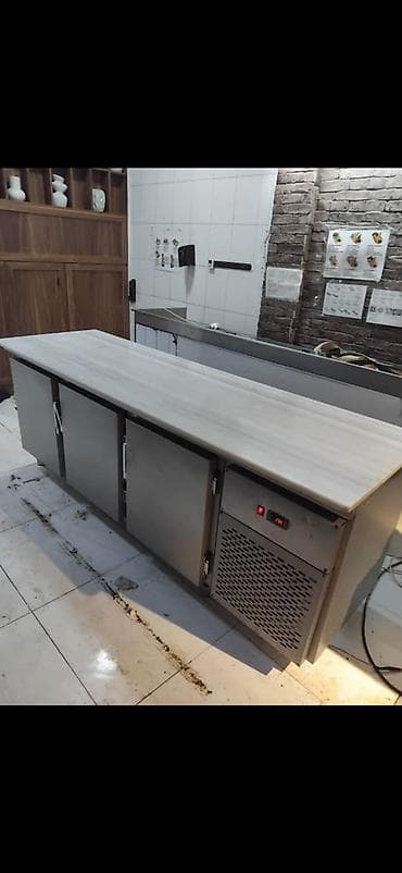 Restoran tipli 3qapili, nerj materialli, ustu mərmər,asaqi hissəsi at lalafo.az Restoran tipli 3qapili, nerj materialli, ustu mərmər,asaqi hissəsi