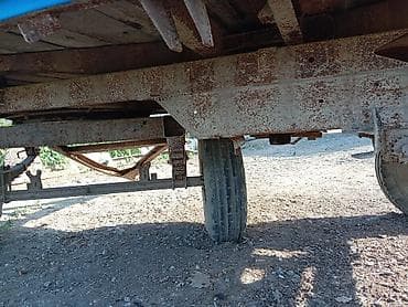 Kənd təsərrüfatı üçün ikioxlu traktora qoşulan qoşqu (saman, taxıl