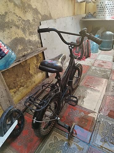 Uşaq velosipedi satılır qiyməti 30 manat möhkəm matrealdır 95 manata — 2