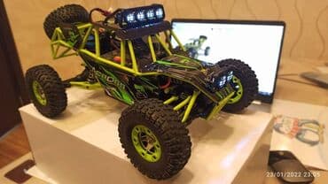 rc car: Wltoys 12428 Rc Car 1/12 Scale. 4WD .2.4Ghz 5Km/h speed.540 Brushed — 5
