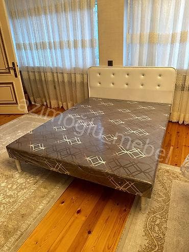 İkinəfərlik çarpayı