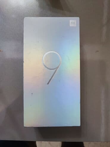 Xiaomi Mi 9, 128 GB, rəng - Mavi, 
 Barmaq izi, Sensor, Simsiz şarj