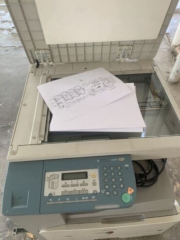 notbuklar ucuz: Ağ rəngli ofis çoxfunksiyalı printer. Bu, çap, surət çıxarma və skan — 1