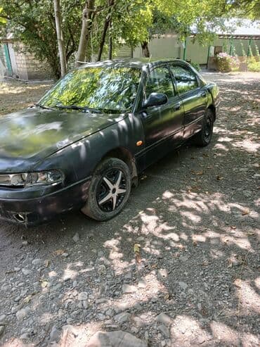 islenmis tekerler type 0 per page 40: Mazda 626 sedan Xüsusiyyətlər: - Güzgülərdə və kuzovda qara rəng - 4 — 1