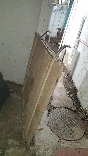 Təmir və tikinti: Metal karkaslı taxta qapı paneli - Material: qalın faner/taxta lövhə — 1