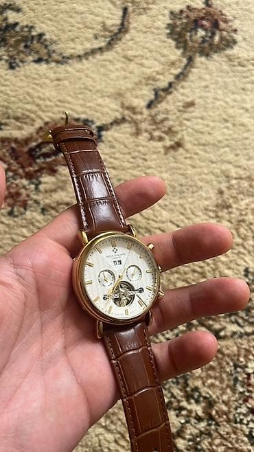 gun eynəyi: Patek Philippe Geneve qol saatı (MEXANİKA) Təmiz mexanikadır — 1