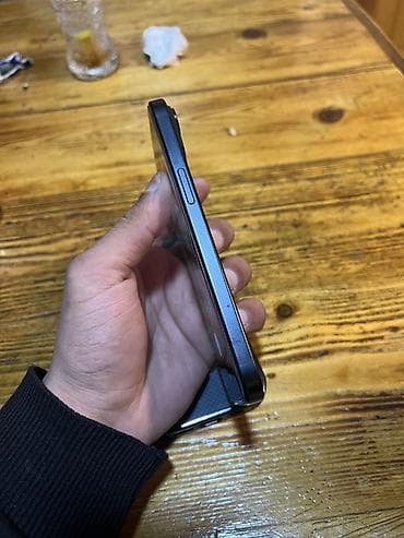 1 tr harddisk: IPhone 15, 128 GB, Midnight, Face ID — 5
