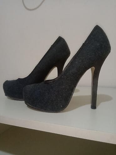 Xaricdən alınıb.boz rəng kaşmire oxşar material dandı.az geyinilib