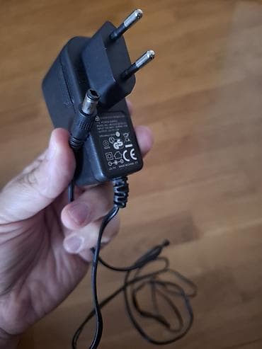 nikai tv: TV və elektronika aksesuarları dəsti Tərkib: - 12V 1.0A adapter — 3