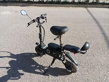 e39 guzgu: Elektrikli skuter. 10 Ah. Tam doldurma ilə 20-25 km. Sürət təxminən 20 — 6