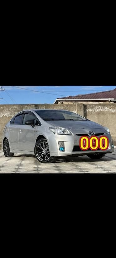 prius bufer: Toyota Prius (3-cü nəsil) hibrid hetçbek - Gümüşü rəng, aerodinamik — 1