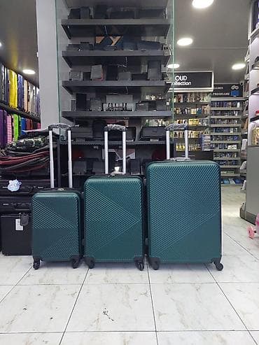 Çamadanlar: Sərnişin çamadan dəsti – 3 ölçü - Rəng: tünd yaşıl - Korpus: sərt — 1