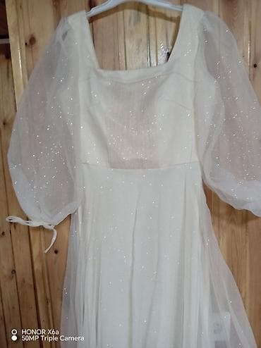 koja etek: Pineline Women Wear, ölçü 36, krem rəngli uzun paltar. - Model — 1