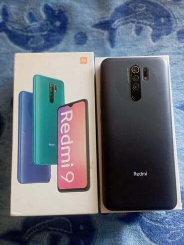 xiaomi 12s ultra qiyməti: Redmi 9 smartfonu, qara rəngdə, öz qutusunda və sənədləri ilə təqdim — 2