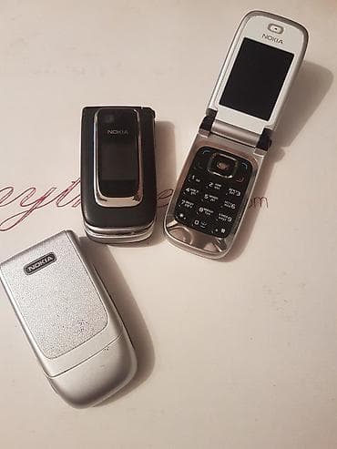 islenmis notebook satiram: 6131 Antik madel telefon tam idial veziyetdei qesheng ishdiyir — 2