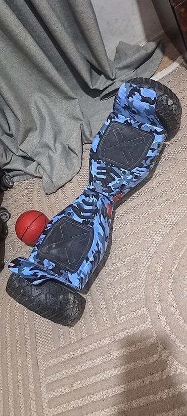 Korpus: Mavi-qara kamuflyaj dizaynlı hoverboard (self-balance skuter)