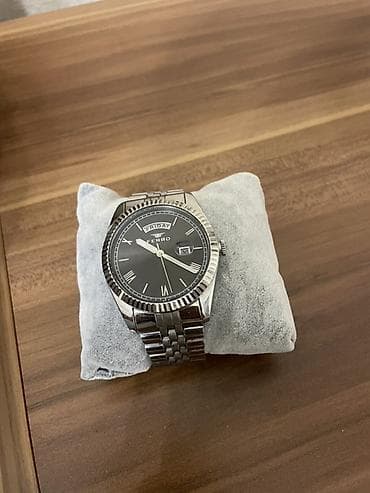 Qol saatları: Məhsul: Kişi qol saatları – 2 model 1) Rolex Oyster Perpetual (qara — 2