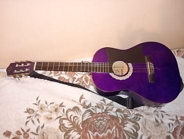 gitara satilir: Bənövşəyi rəngdə, 6 simli akustik gitara. Ön hissəsində qara rəngli — 3