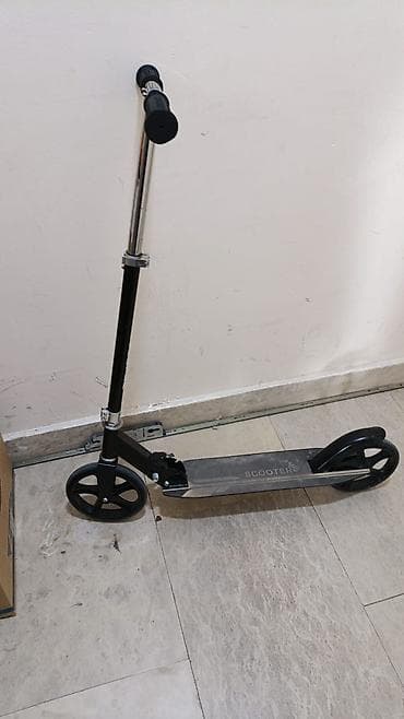 scooter az: Şəhər üçün mexaniki skuter - Konstruksiya: yüngül, möhkəm metal — 1