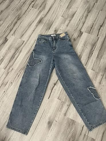 Cinslər: Məhsul: BLACK COCO brendinin qadın jeans şalvarı - Model: Geniş kəsim — 1