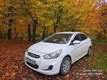 accent stop: Hyundai Accent: 1.4 l | 2015 il Sedan — 5
