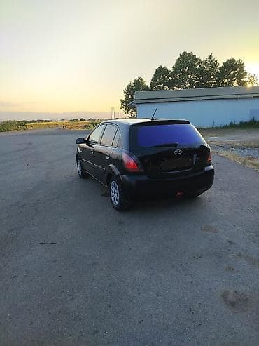 Kia Rio: 1.5 l | 2005 il Hetçbek — 2