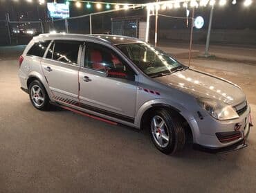 kia ceed 2010: Opel Astra: 1.3 l | 2006 il 295000 km Universal — 4