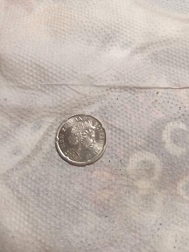 Məhsul: 20 sentlik sikkə (Yeni Zelandiya) Təsvir: - Nominal: 20 cents