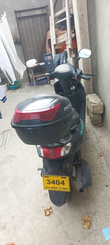 мотороллер муравей купить в бишкеке: Ziq zaq benzin Xüsusiyyətlər: - Rəng: qara, yaşıl vurğular - Arxa — 1