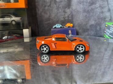 metbex tavan modelleri: Коллекционная модель Opel Speedster orange 2000 DeAgostini Art  — 5