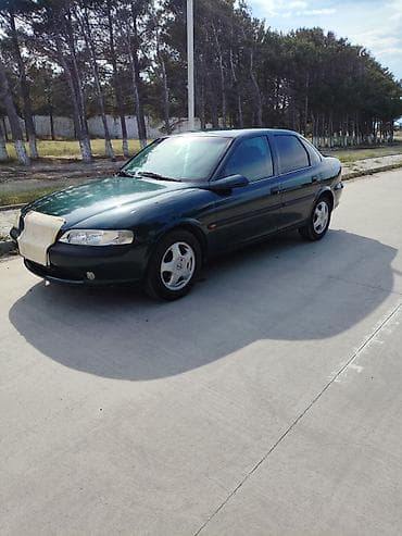 lezva diskler: Opel Vectra B sedan – tünd yaşıl rəng, 4 qapı, 5 yerlik rahat salona — 2