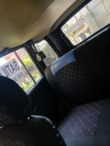 niva şit: LADA Niva 4x4, mavi rəng, 5 qapılı universal kuzov. Xüsusiyyətlər: - — 10