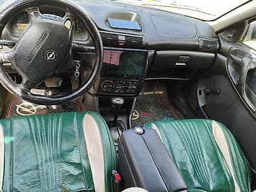 ford tranzit 1998: Opel Astra: 1.6 l | 1996 il Universal — 10