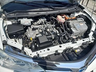 Водный транспорт: Toyota Corolla Fielder Hybrid, ağ rəng, universał kuzov. Texniki — 2