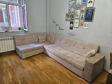 Divan satılır 250₼. açılır bazası var.Ünvan yeni