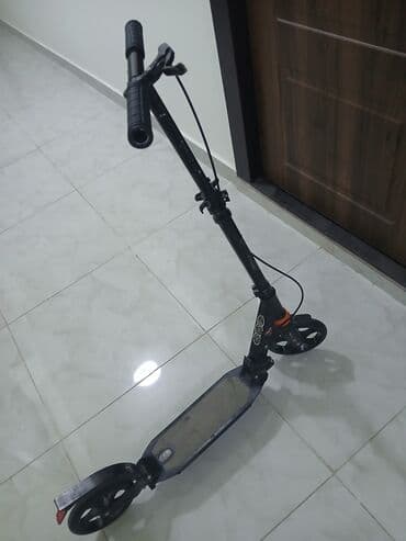 qaçış aparatı 2ci el: Şəhər içi hərəkət üçün yığcam skuter - Tip: Mexaniki (ayaqla itələmə) — 1