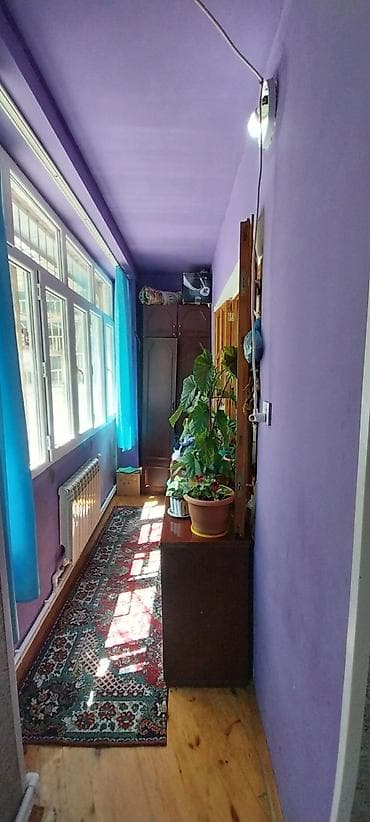 Sumqayıt 9cu mkr,9/1 künc ev3 otaqlı temirli 70 kv,kombi sistemi — 9