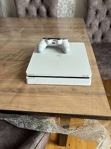 fm network: PlayStation 4 Slim (ağ rəng) - Rəsmidə olan ağ PS4 Slim konsolu - — 1