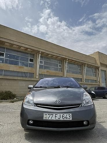 Toyota Prius (2-ci nəsil) hibrid hetçbek Real alciyla yerinde qiymet