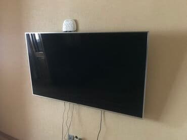 plazma smart tv: Panasonic Smart TV – iri diaqonallı, nazik çərçivəli divara montaj — 4